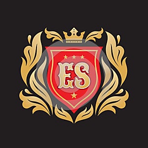 Monogram E & S initial letters - concept logo template design. Crest heraldic luxury emblem. Red shield, golden leaves and crown