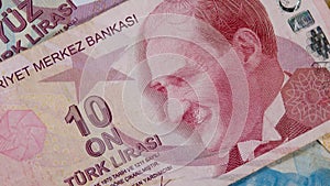 Monogram first president Mustafa Kemal Ataturk on red 10 turkish lira TRY banknote