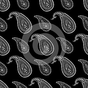 Monohcrome seamless pattern with Paisley motifs on black background