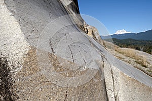 Monolit of the granite stone and mountain