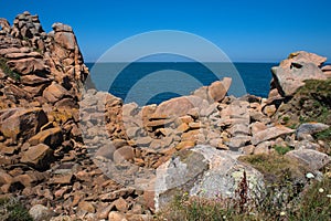 Monolithic blocks of pink granite in the Cotes d\'Armor in Brittany, France