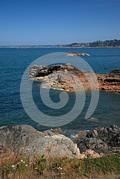 Monolithic blocks of pink granite in the Cotes d\'Armor in Brittany, France.