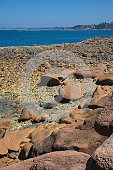 Monolithic blocks of pink granite in the Cotes d\'Armor in Brittany. Pink granite coast