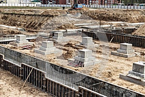 Monolithic reinforced concrete foundations for the construction of a large building. Rostverk at the construction site.