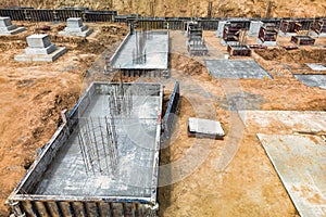 Monolithic reinforced concrete foundations for the construction of a large building. Rostverk at the construction site.