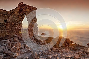 Monolithos Castle at bright sunset. Rhodes Island, Greece