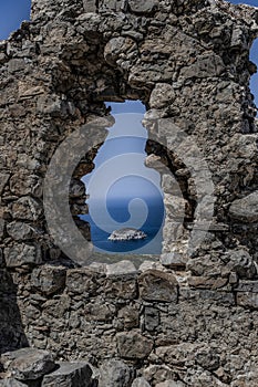 Monolithos knights castle overlooking the Mediterranean sea from hilltop.