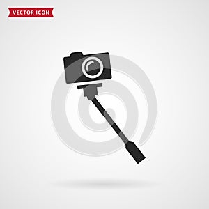 Monopod with camera vector icon photo