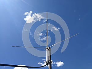 Monopole antenna in front of blue sky