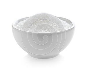 Monosodium glutamate in bowl on white background