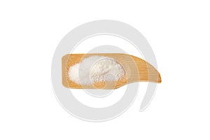 Monosodium glutamate, MSG powder in wooden serving scoop. White powder, Flavor enhancer. Chinese salt, food additive E621 is used