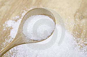 Monosodium glutamate MSG in wooden spoon