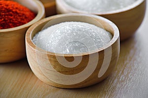 Monosodium Glutamate in wood bowl