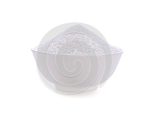 Monosodium glutamate in wood bowl on white background