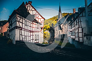 The beautiful and enchanted village of Monreal am Elzbach with German half-timbered houses photo