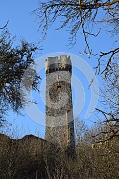 Monreal, Germany - 12 12 2022: Philippsburg tower between trees photo