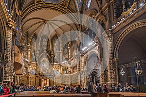 MONSERRAT, SPAIN - FEBRUARY 20, 2019: Interior of the Basilica of the Montserrat Monastery in the abbey of Santa Maria de