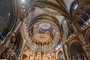 MONSERRAT, SPAIN - FEBRUARY 20, 2019: Interior of the Basilica of the Montserrat Monastery in the abbey of Santa Maria de