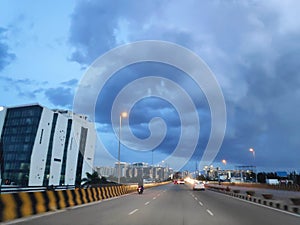 Monsoon clouds over a highway