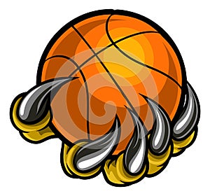 Monster or animal claw holding Basketball Ball