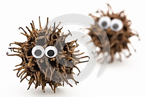 Monsters with googly eyes on white background