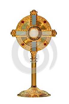 Monstrance or ostensorium displaying the consecrated host, the Body of Christ photo