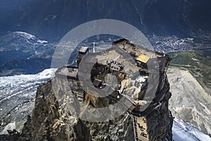 Mont-Blanc massif : Aiguille du Midi, with in the background the town of Chamonix down in the valley - Chamonix, Haute-Savoie, Fra