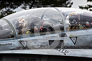 MONT-DE-MARSAN, FRANCE - MAY 17, 2019: Pilots in the cockpit of a Spanish Air Force Boeing F/A-18 Hornet fighter jet plane taxiing