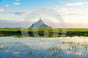 Mont Saint Michel abbey on the island with reflection, Normandy, Northern France, Europe