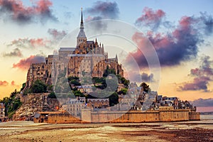 Mont Saint Michel island, Normandy, France, on sunset