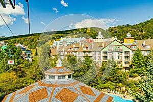 Mont Tremblant, beautiful national park and village in perfect harmony with nature. Tiled roofs of hotels. The unique