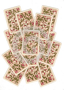 A montage of antique playing cards showing backs.