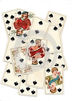 A montage of antique playing cards showing spades.