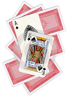 A montage of playing cards with a king and ace of spades revealed.