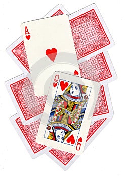 A montage of playing cards with a queen and ace of hearts revealed.