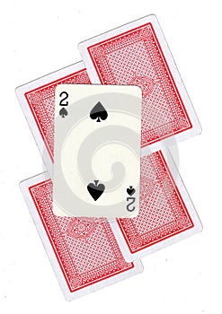 A montage of playing cards with a two of spades revealed.