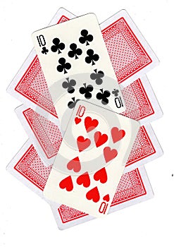 A montage of playing cards with two tens revealed.