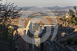 MONTALCINO, TUSCANY/ITALY: OCTOBER 31, 2016: Narrow street in historic center of Montalcino town, Val d`Orcia, Tuscany, Italy.