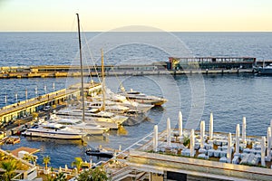 Monte Carlo, Monaco 29.11.2020 Sailing boats yachts and modern vessels in port on seascape background