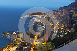 Monte Carlo panorama illuminated by night. Urban landscape with luxury architecture