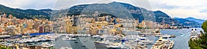 Monte Carlo panorama with luxury yachts and grand stands by the in harbor for Grand Prix F1 race in Monaco, Cote d'Azur