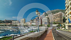 Monte Carlo Port Hercule panorama timelapse . View of luxury yachts and houses around harbor of Monaco, Cote d'Azur.