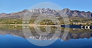 Monte Cinto Massif reflecting in Calacuccia Lake photo