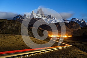 Monte Fitz Roy in los glaciares national park with car light trail and the road to El Chalten, Patagonia, Argentina. photo