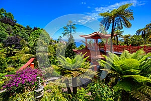 Monte Palace - Tropical Garden with Waterfalls, Lakes and traditional buildings above the city of Funchal - popular tourist