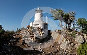 Monte Poro Lighthouse near Marina di Campo on the island Elba photo