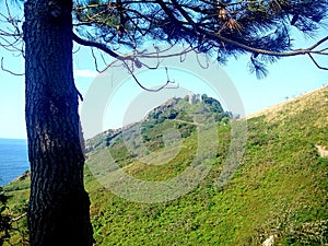 Monte Ulia in San Sebastian (Donostia) Cantabrian Coast. Guipuzcoa, Spain Pasajes Lighthouse. photo