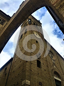 Montecassiano town, Marche region, Italy. Medieval buildings, church, clock tower, beauty, history and time
