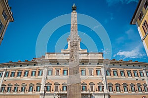 Montecitorio Obelisk in the foreground and in the background the building of the Chamber of Deputies in Rome, Italy