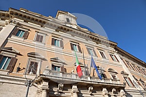 Montecitorio Palace seat of the Italian Parliament with the flag